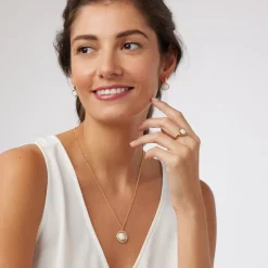 The Met Store Celestial Symbols Carved Mother-of-Pearl Coin Hoop Earrings