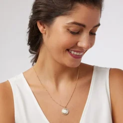 The Met Store Celestial Symbols Carved Mother-of-Pearl Pendant Necklace